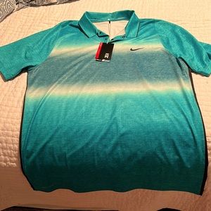 Men’s Nike golf polo. Tiger woods performance brand. Teal and black. L.